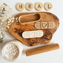 Load image into Gallery viewer, Band-Aid Bio Dough Cutter  and Kindness Heart Counters | designed for Curious Wren
